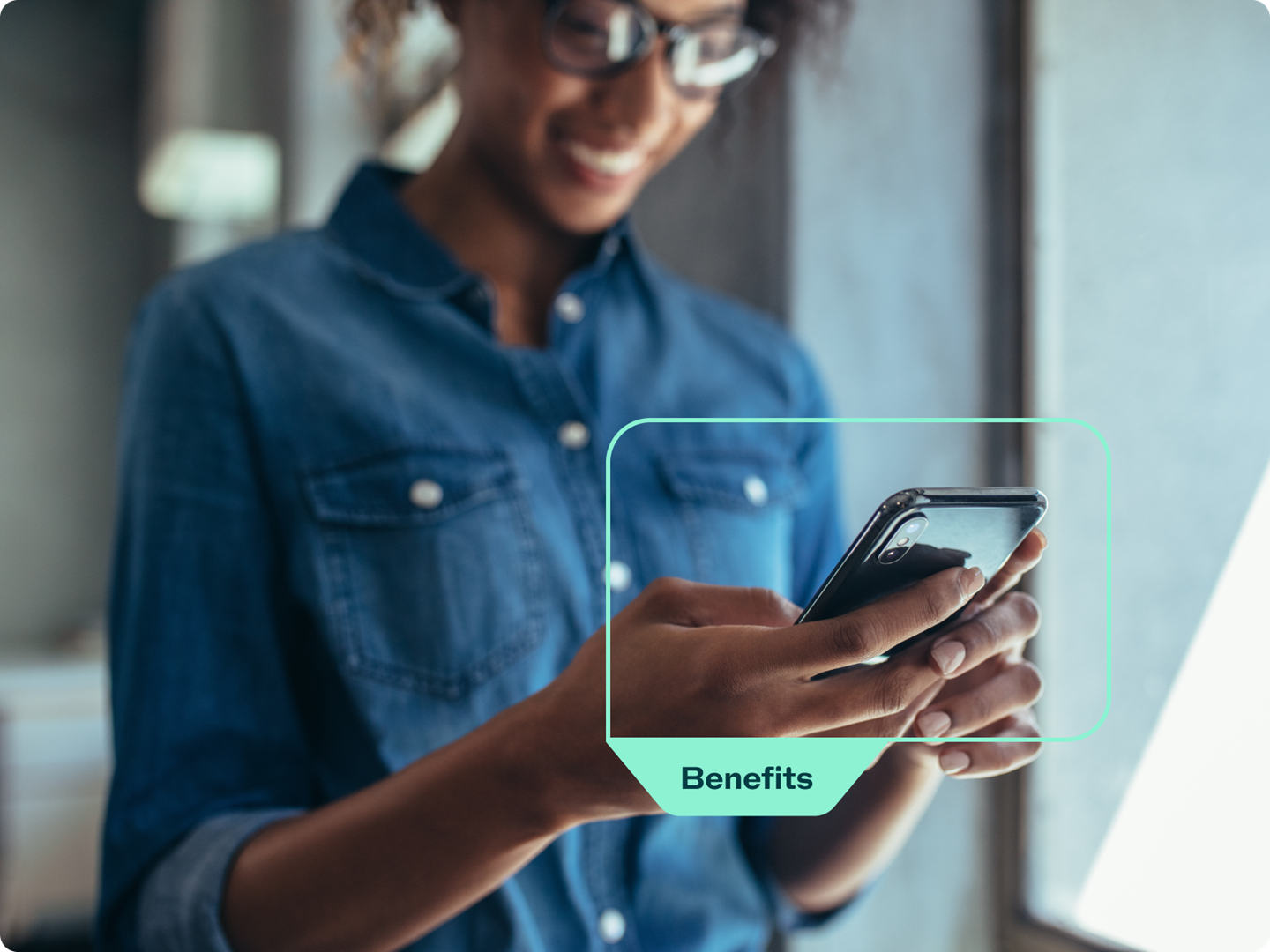 Person using mobile phone for benefits