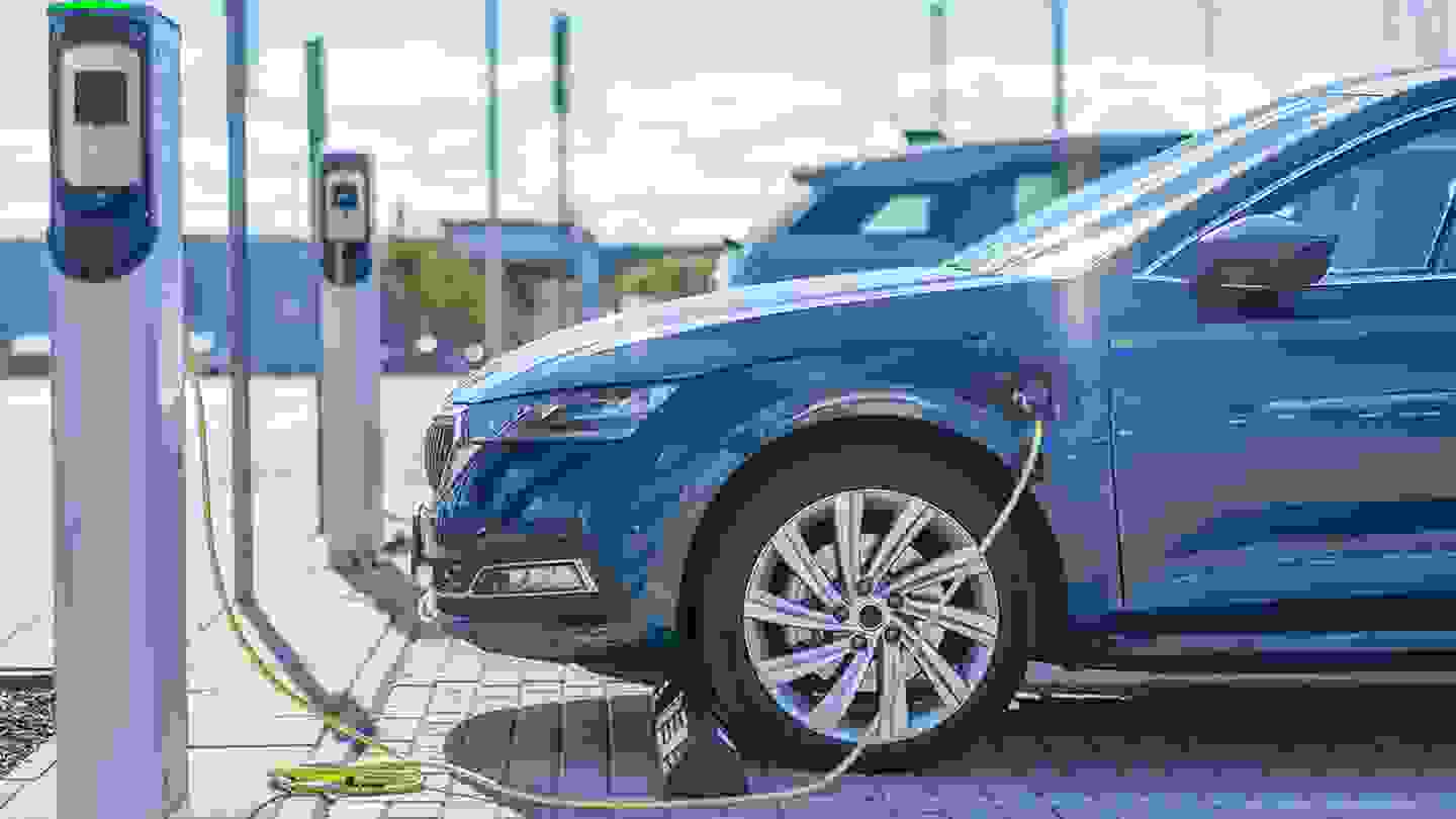 an electric car plugged into a charging station