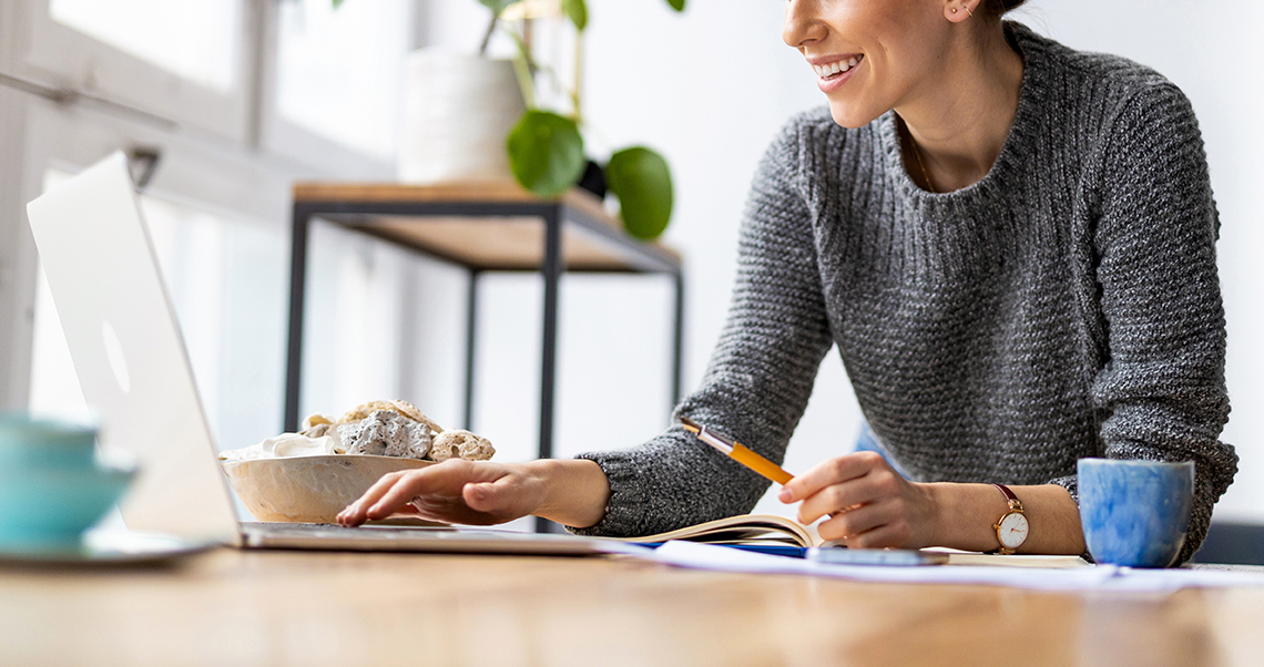 Woman browsing laptop