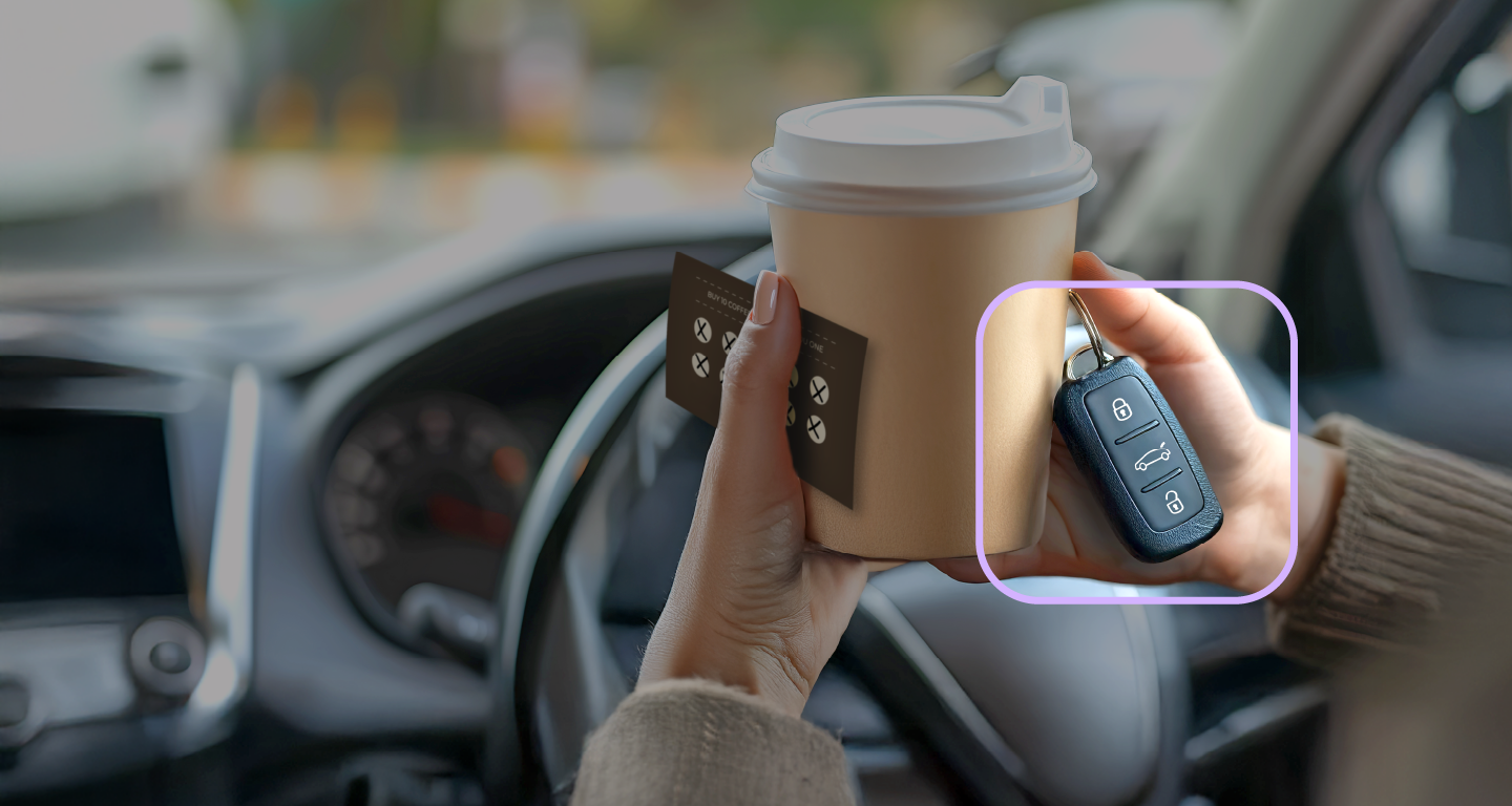Person holding keys and cup of coffee, indicating tax savings from novated leasing